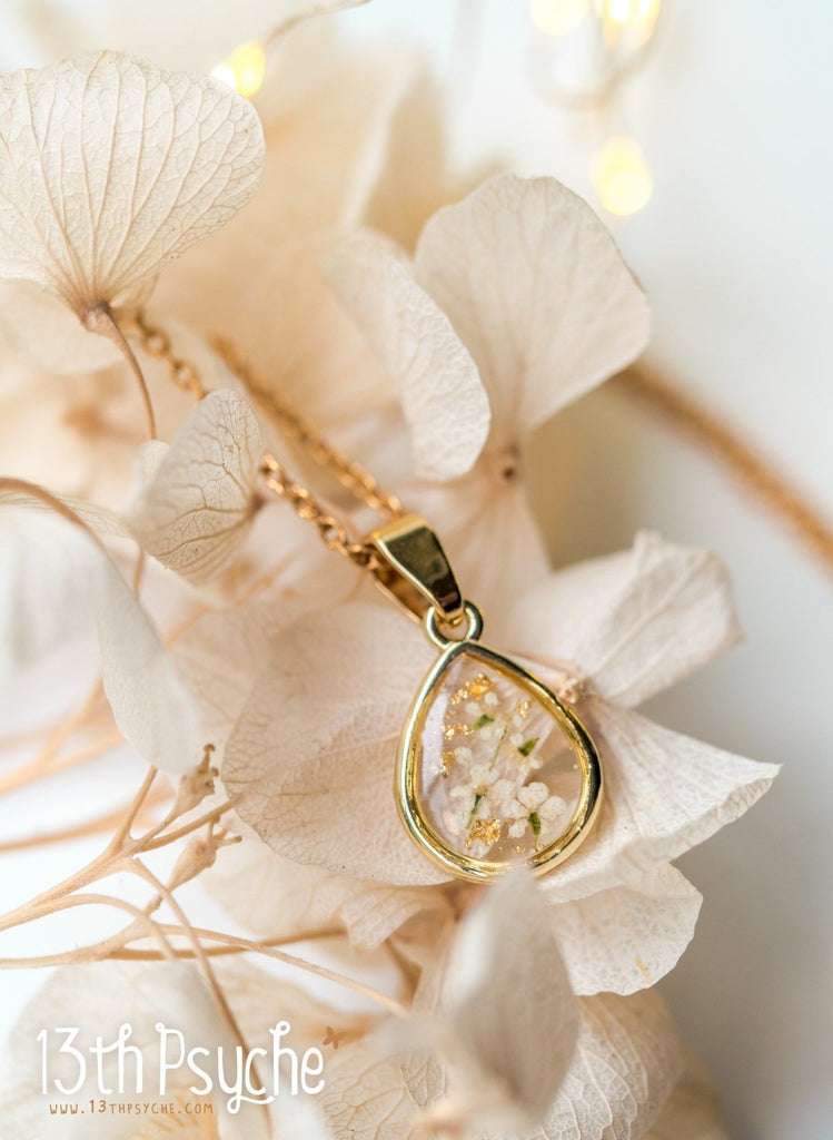Handmade Dried white flowers and gold flakes resin teardrop pendant necklace - 13th Psyche