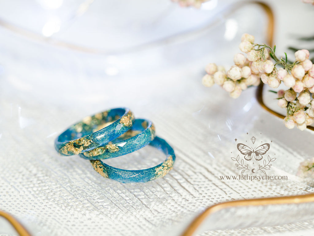Handmade Iridescent blue faceted resin ring with gold metal flakes - 13th Psyche