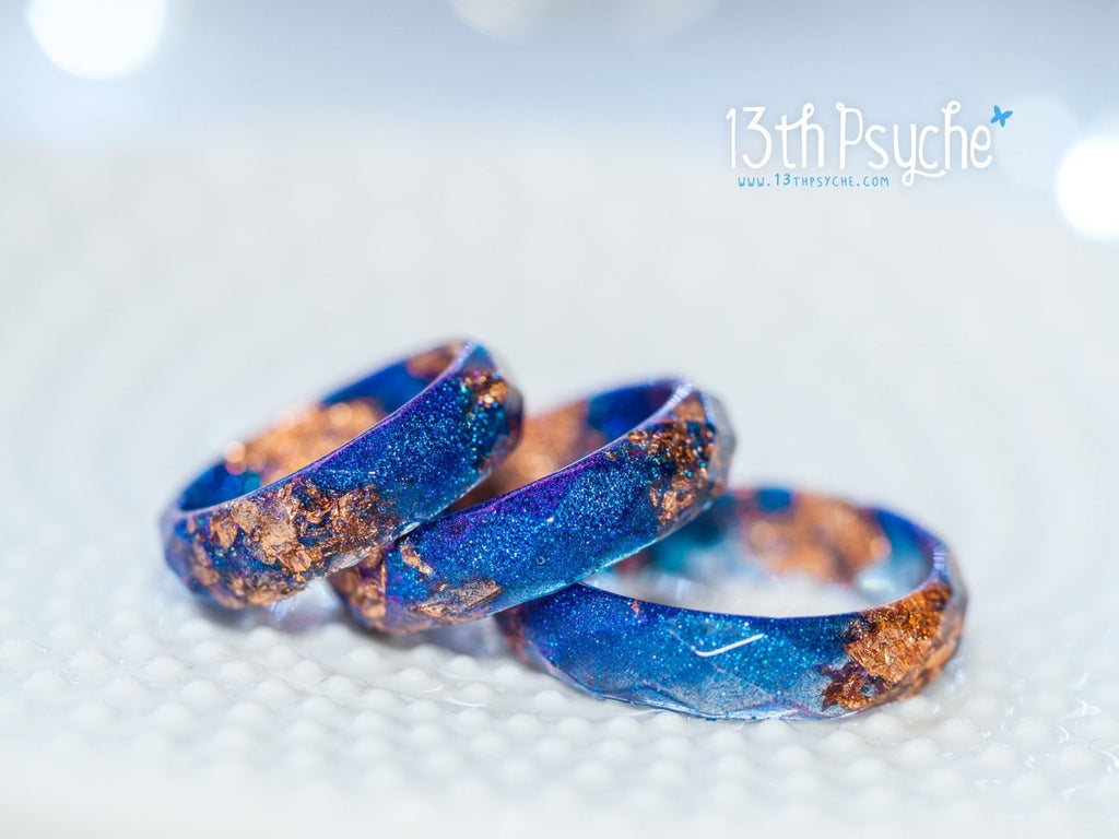 Handmade Iridescent blue faceted resin ring with rose gold flakes - 13th Psyche