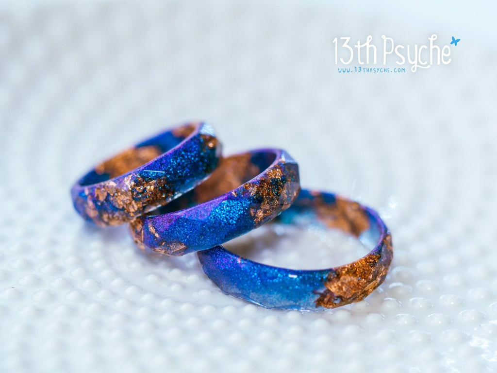 Handmade Iridescent blue faceted resin ring with rose gold flakes - 13th Psyche
