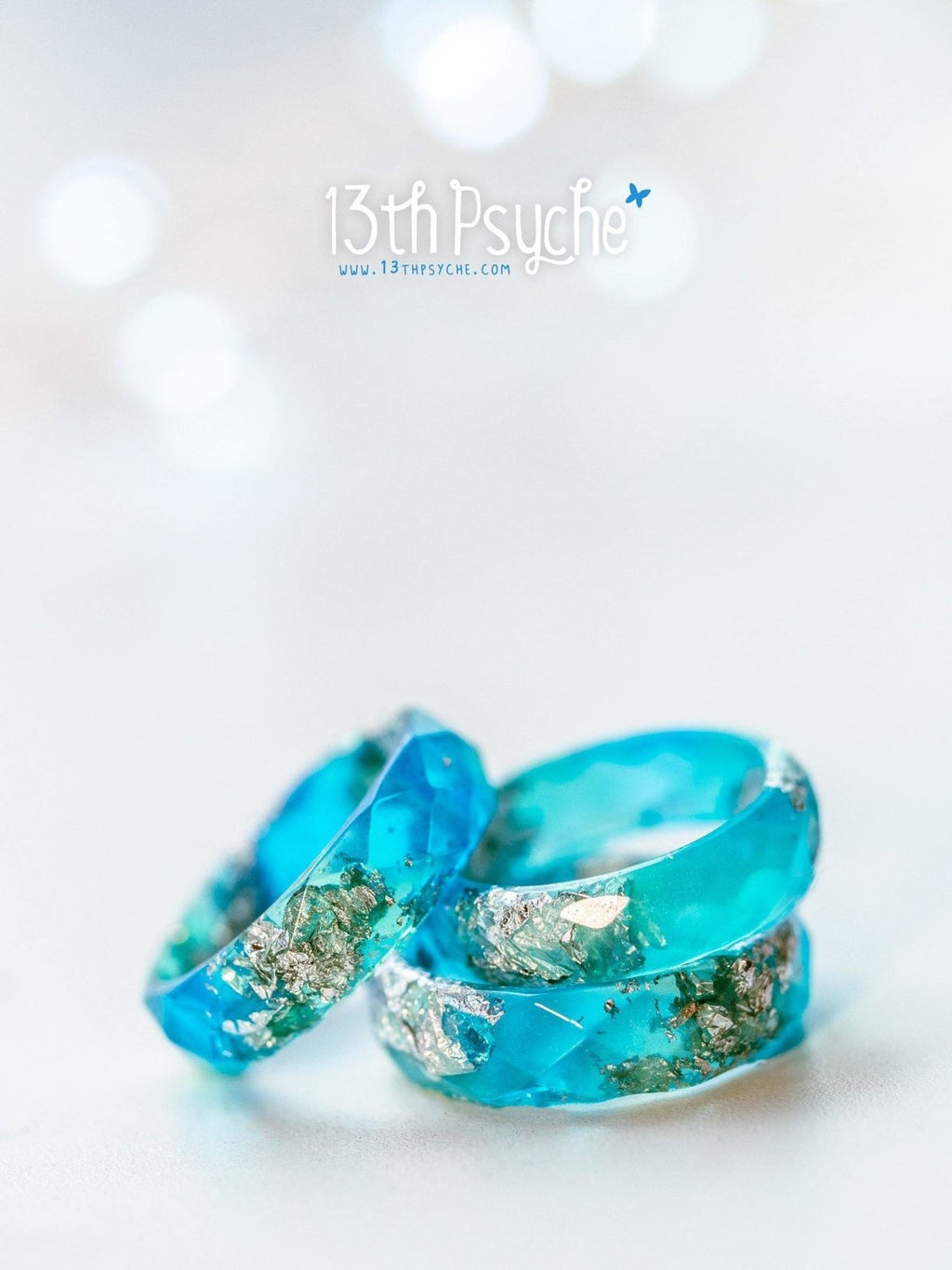 Handmade Clear blue and turquoise faceted resin ring with silver flakes - 13th Psyche