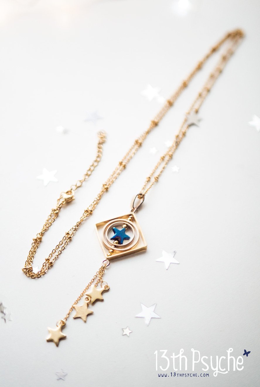 Handmade Space inspired shooting star spinner necklace - 13th Psyche