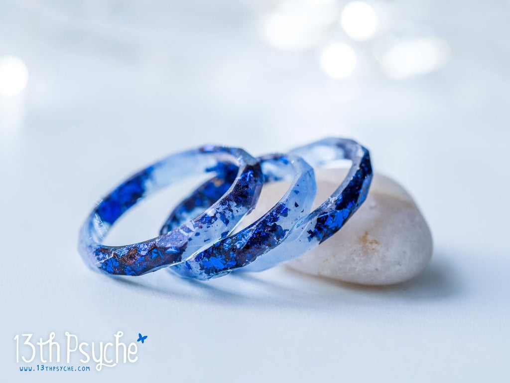 Handmade Light blue faceted resin ring with blue flakes - 13th Psyche