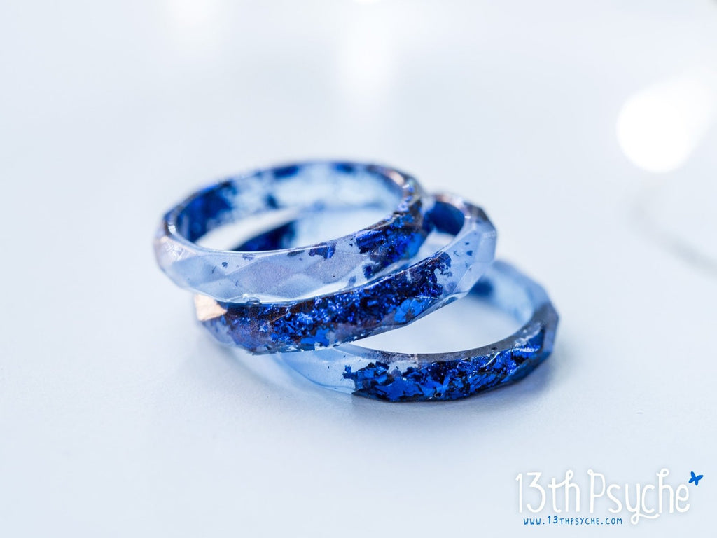 Handmade Light blue faceted resin ring with blue flakes - 13th Psyche