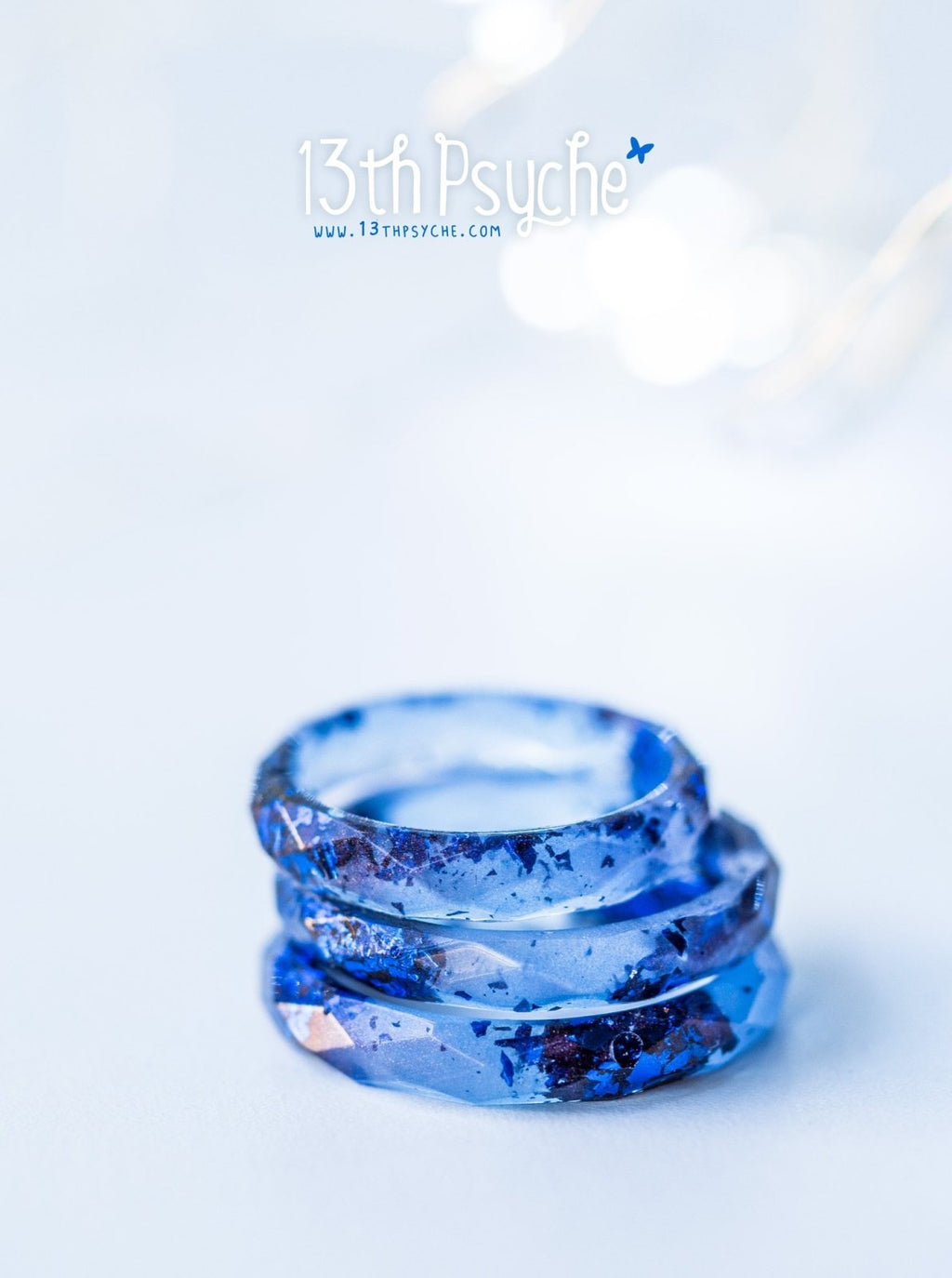 Handmade Light blue faceted resin ring with blue flakes - 13th Psyche