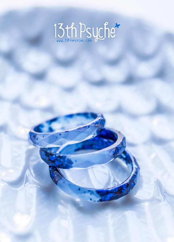 Handmade Light blue faceted resin ring with blue flakes - 13th Psyche