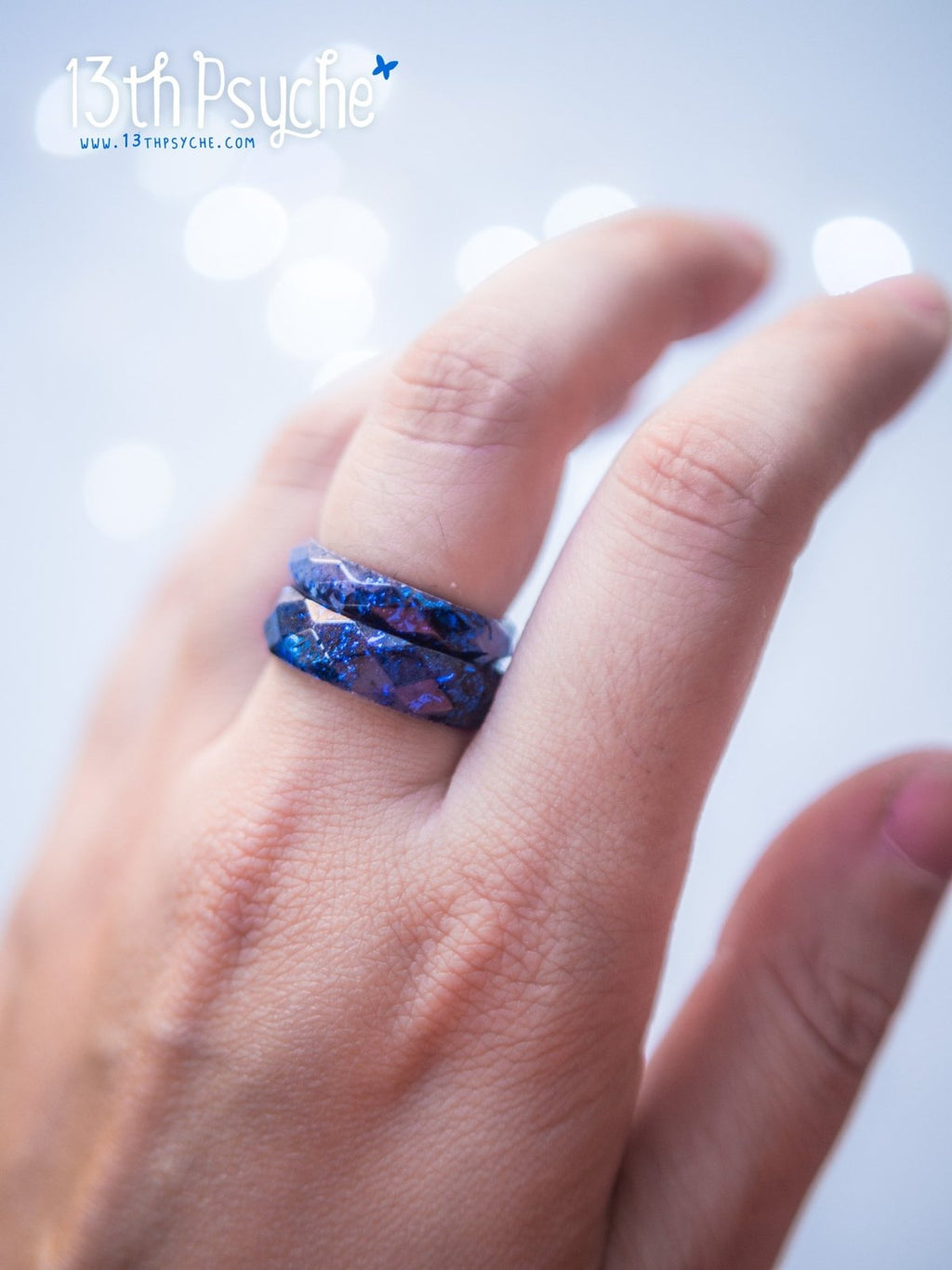 Handmade Light blue faceted resin ring with blue flakes - 13th Psyche