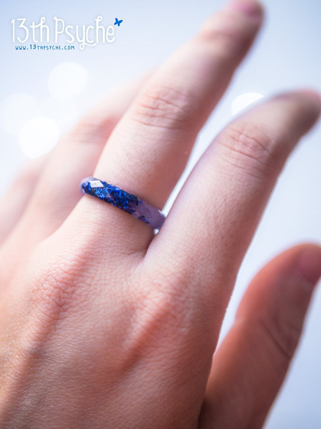Handmade Light blue faceted resin ring with blue flakes - 13th Psyche