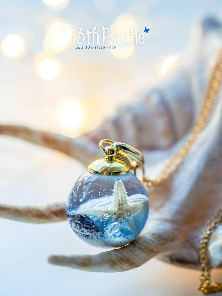 Handmade Ocean inspired Starfish and shells resin ball necklace