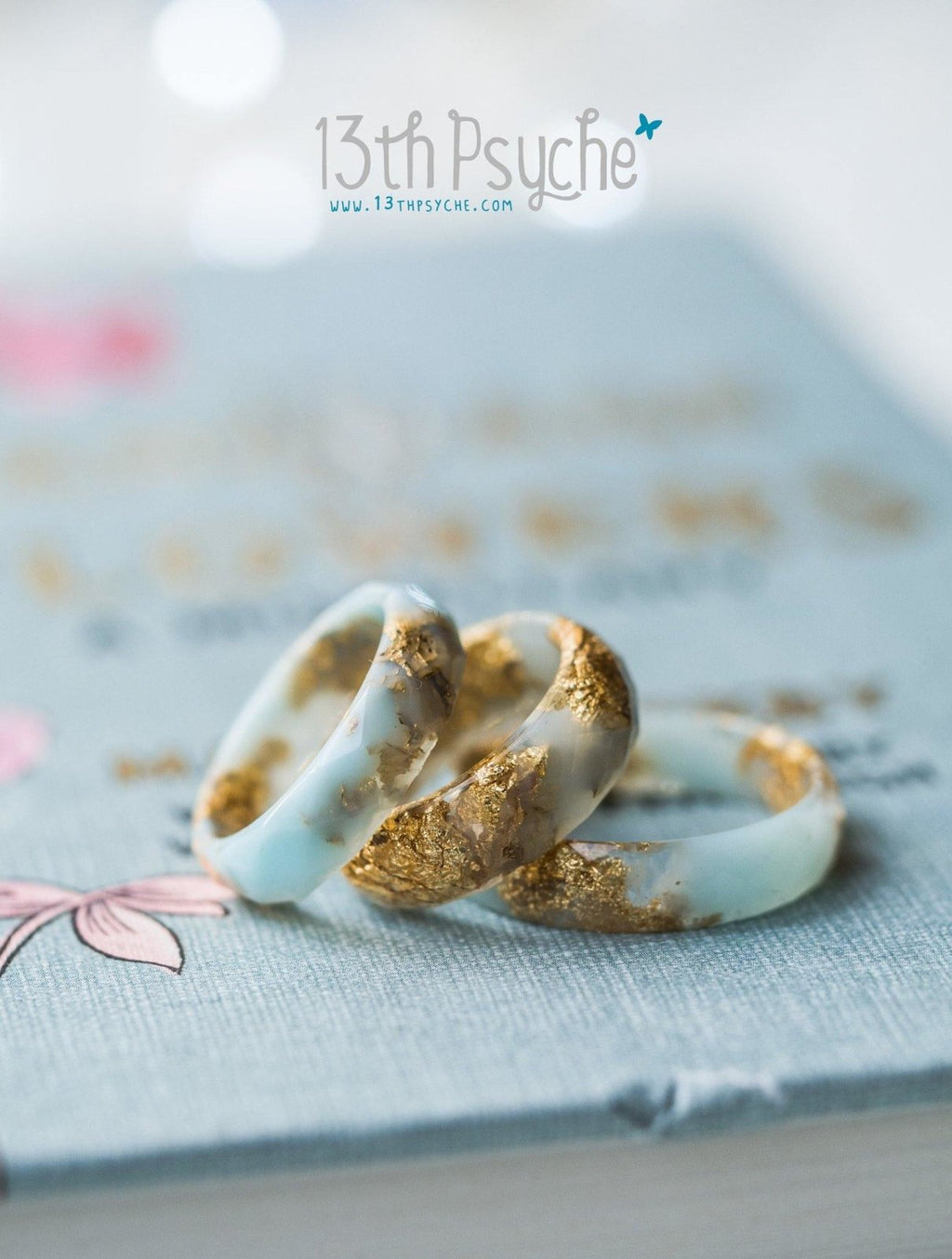 Handmade Clear and Pale blue faceted resin ring with gold flakes - 13th Psyche