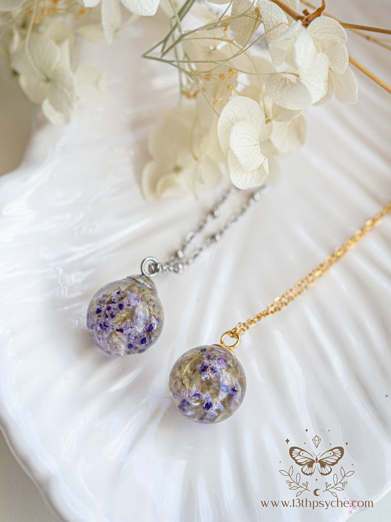 Resin Orb Necklace with Dried Forget Me Not Flowers– 13th Psyche