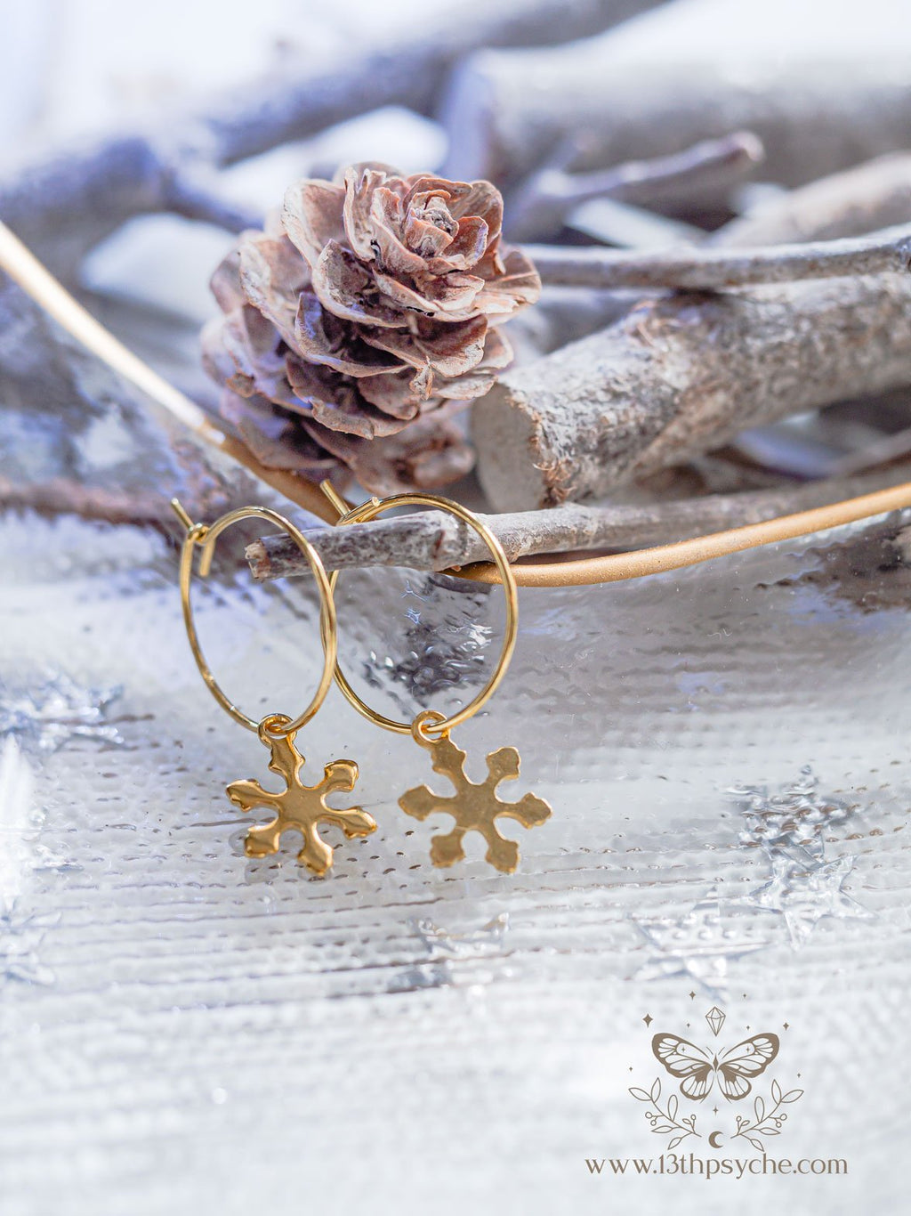 Handmade Hypoallergenic gold hoop earrings with snowflake charm - 13th Psyche
