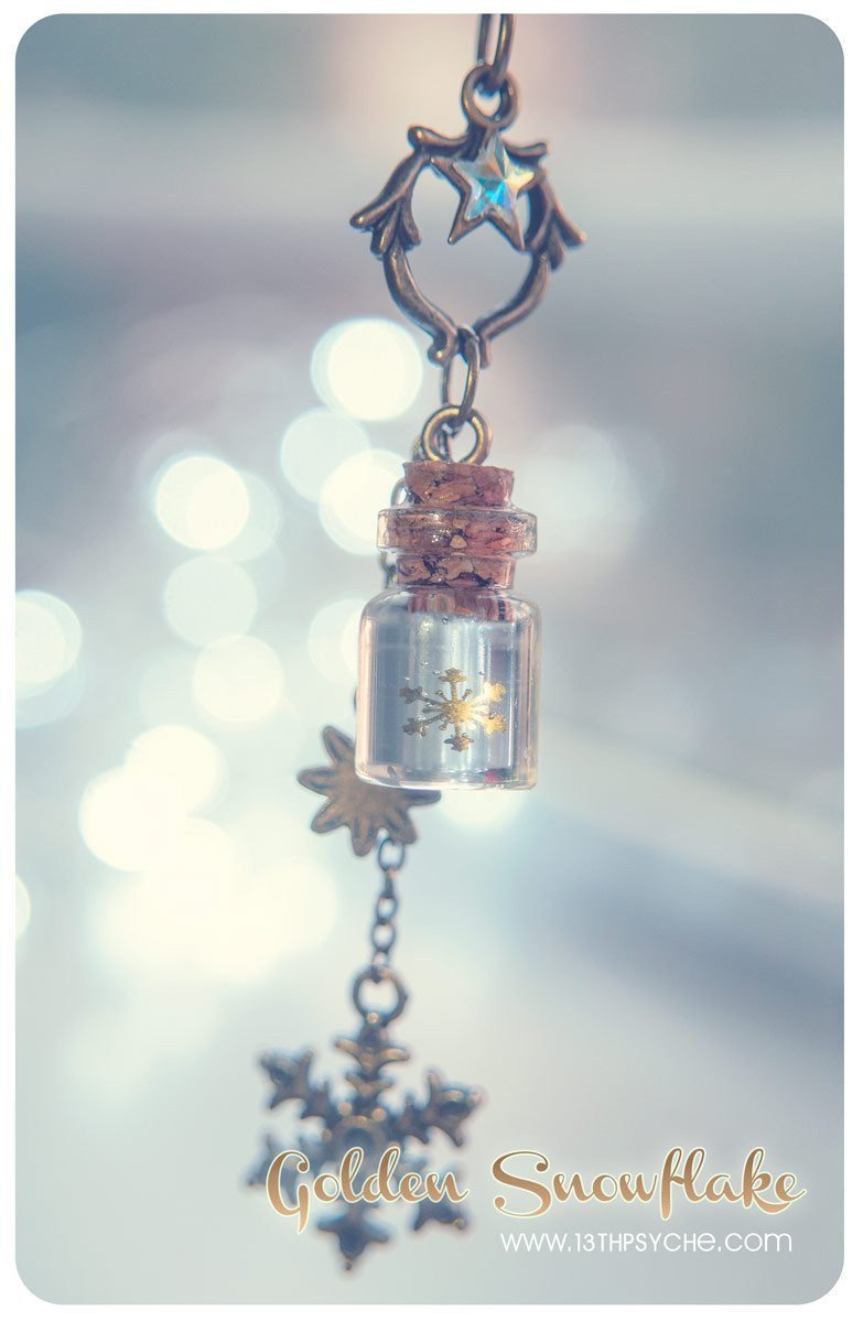 Handmade Golden snowflake glass bottle pendant necklace - 13th Psyche
