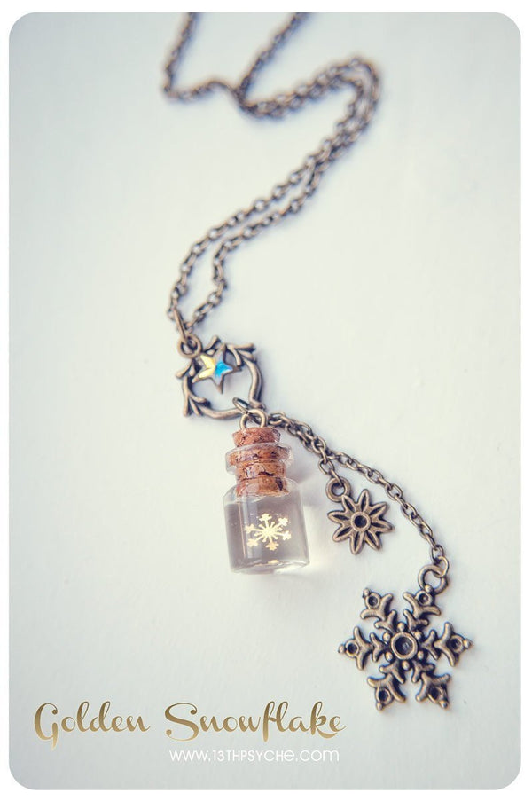 Handmade Golden snowflake glass bottle pendant necklace - 13th Psyche
