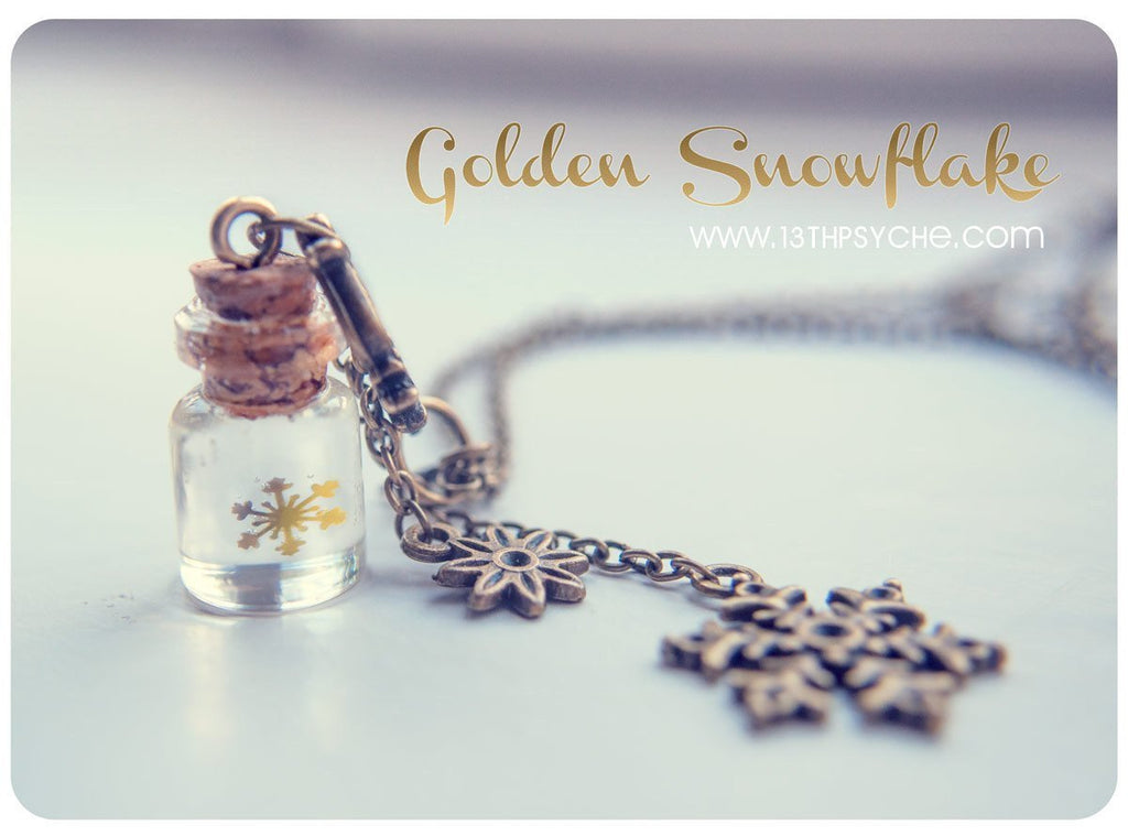 Handmade Golden snowflake glass bottle pendant necklace - 13th Psyche